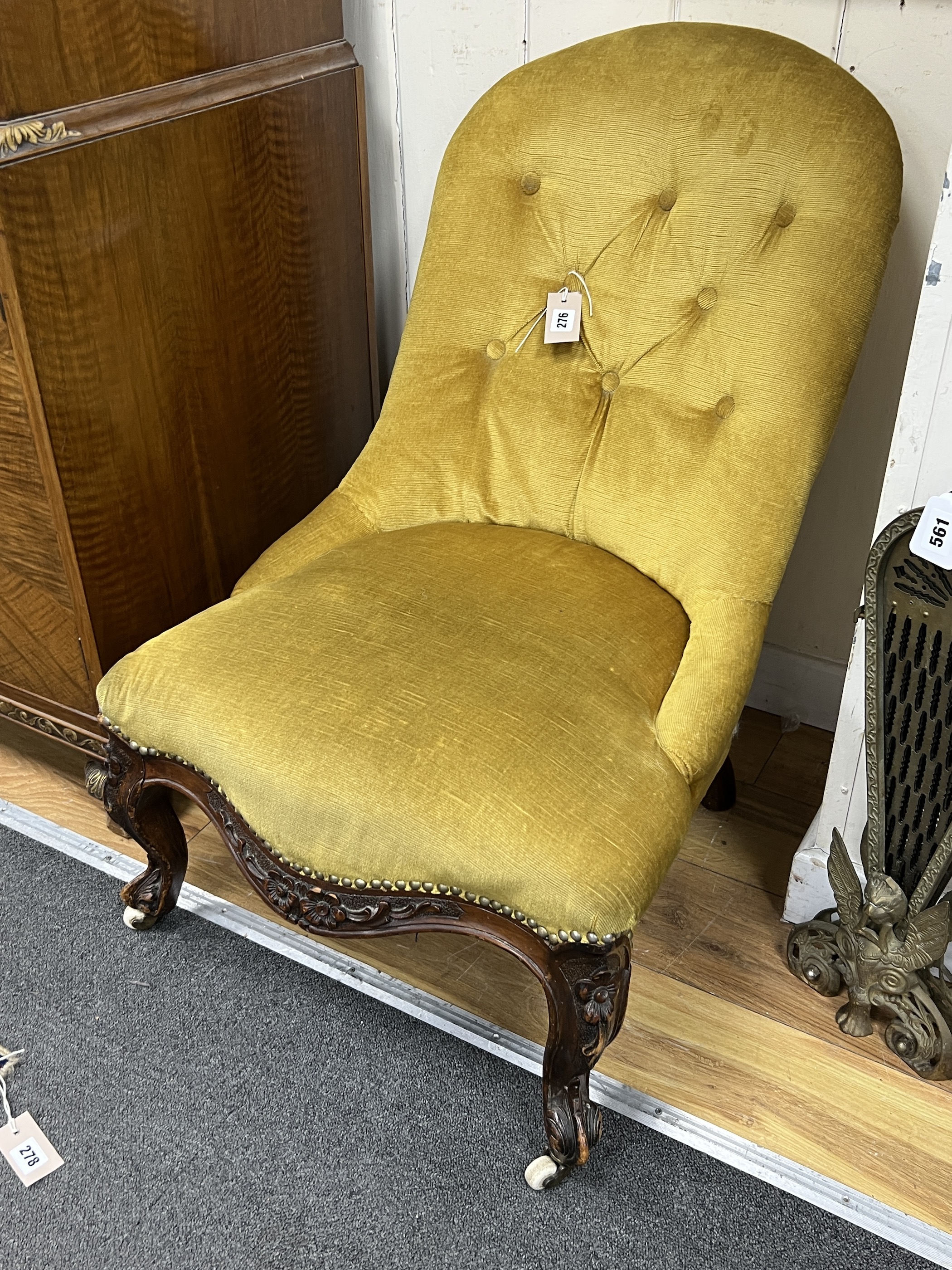 A Victorian spoonback nursing chair, width 50cm, depth 70cm, height 70cm